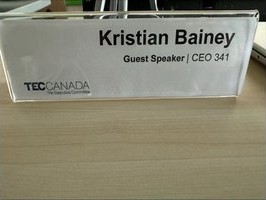 TEC Canada guest speaker nameplate identifying Kristian Bainey
